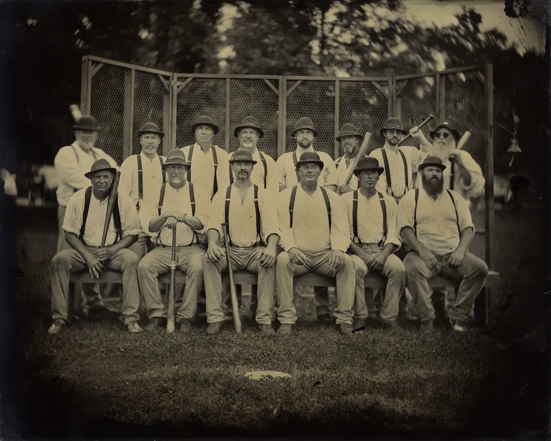 a black and white team portrait of a baseball team