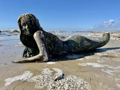 The three-foot-long fiberglass mermaid sold for $300 at auction.