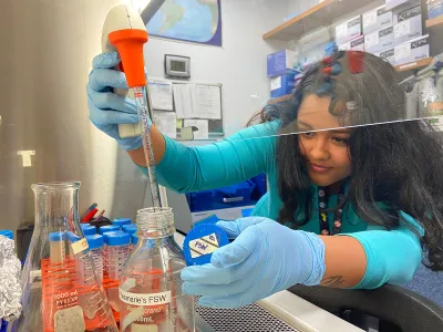 Technician Yesmarie De La Flor prepares cultures of probiotics in the Smithsonian Marine Station&rsquo;s microbiology laboratory in Fort Pierce, Florida. These probiotics were used for testing on diseased corals.