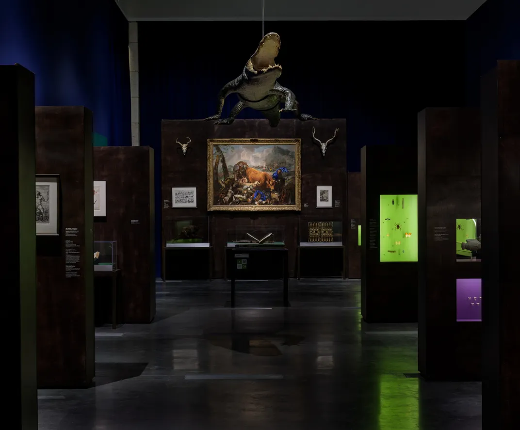 A stuffed crocodile looms over display cases at LACMA.