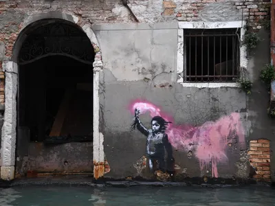 Banksy&#39;s&nbsp;Migrant Child&nbsp;has endured damage from the elements since it appeared in 2019.&nbsp;