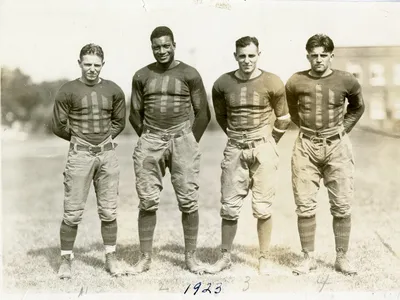 Jack Trice (second from left) and three of his teammates on the varsity football squad