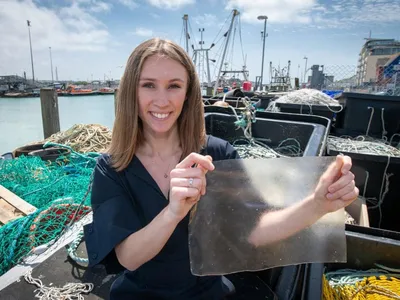 Lucy Hughes holds a piece of MarinaTex.