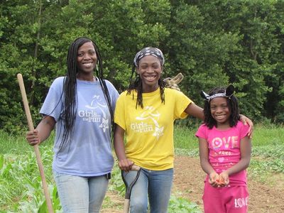 Xanthia DeBerry, with her daughters Angelica and Aniaya, is part of the seed saving project.