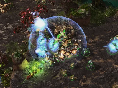 AlphaStar, playing as the StarCraft race Protoss, in green, dealing with flying units from the Zerg players with a combination of powerful anti-air units. The AI program mastered all three races in the game, Protoss, Terran and Zerg.
